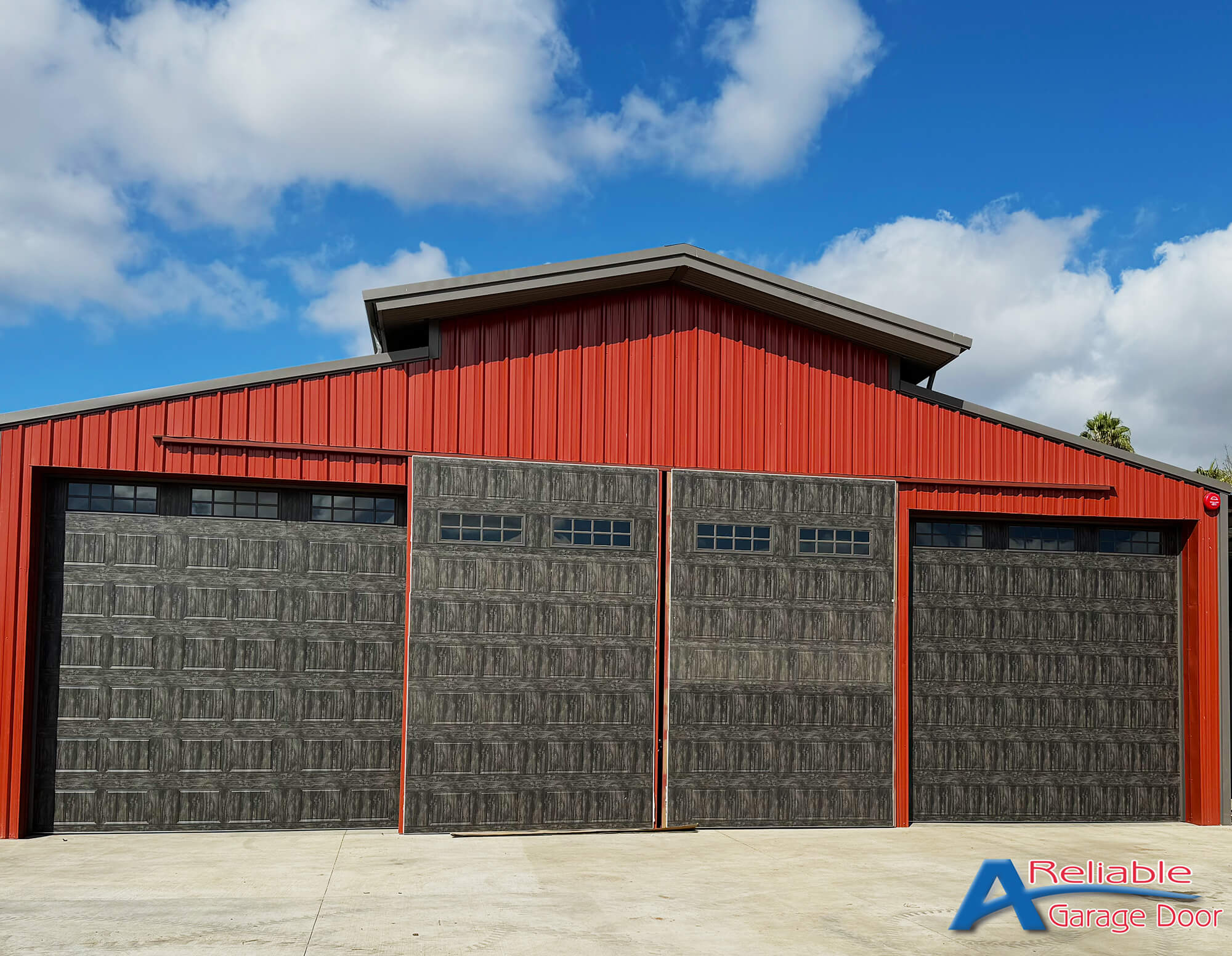 Commercial garage doors installed on a large property in San Diego County