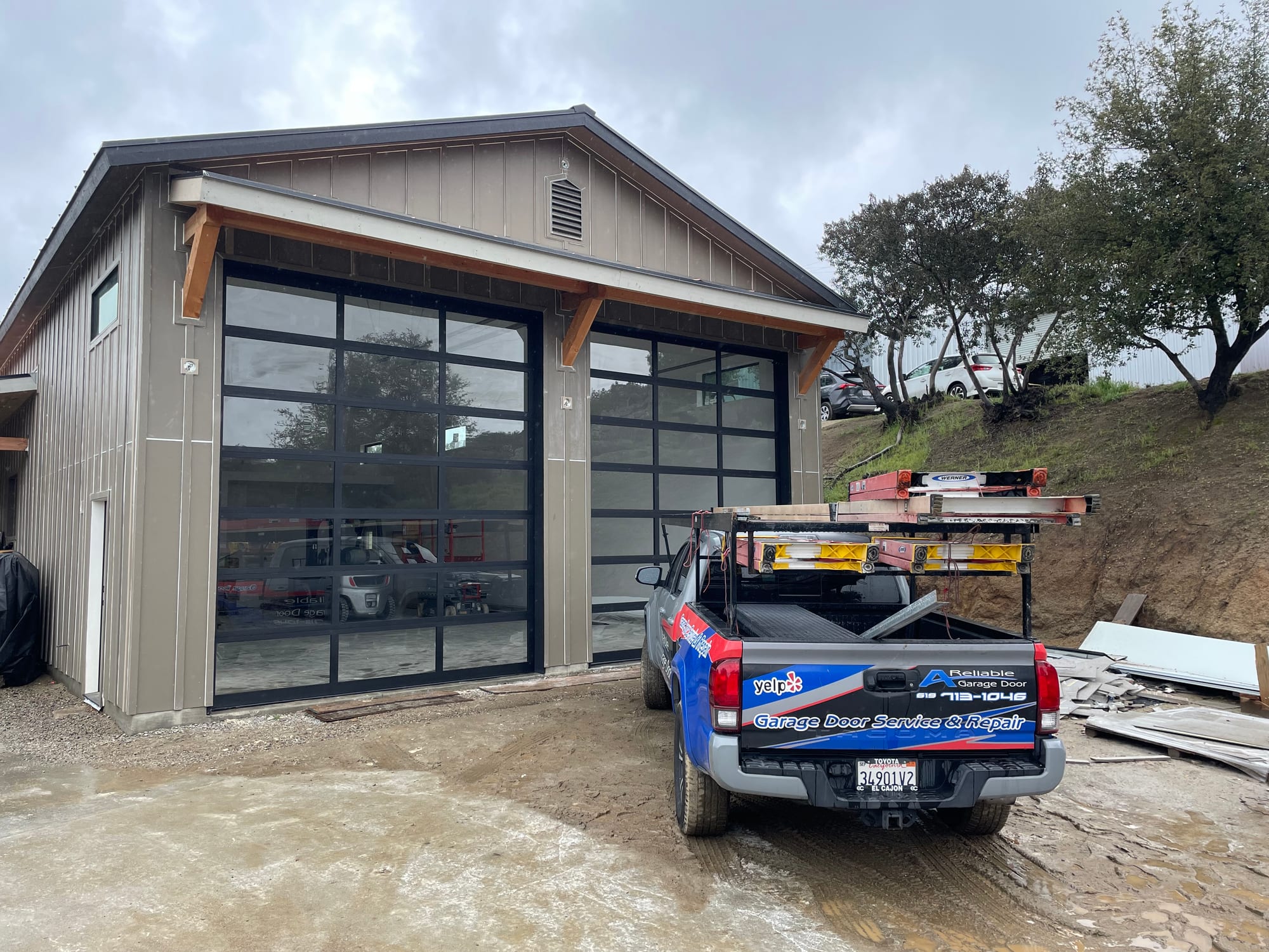 Garage door rollers and hinges replaced for quiet, smooth operation